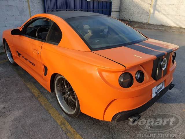 MUSTANG V6 laranja - Leilão de veiculios - Leilão Descomplicado